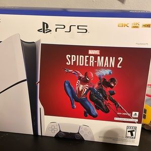 Not brand new but looks and works brand new, ps5 with Spider-Man code